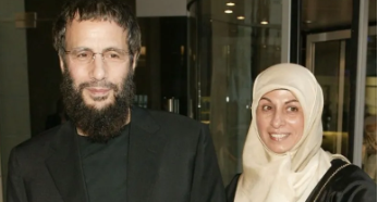 Cat Stevens/Yusuf Islam posing with his wife Fauzia in 2003